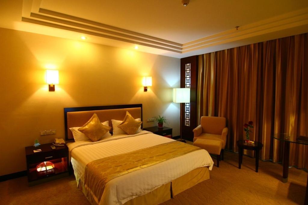 Jinling Yixian Hotel Montes Huang Habitación foto