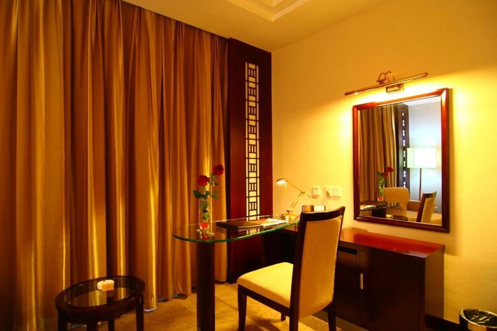Jinling Yixian Hotel Montes Huang Habitación foto